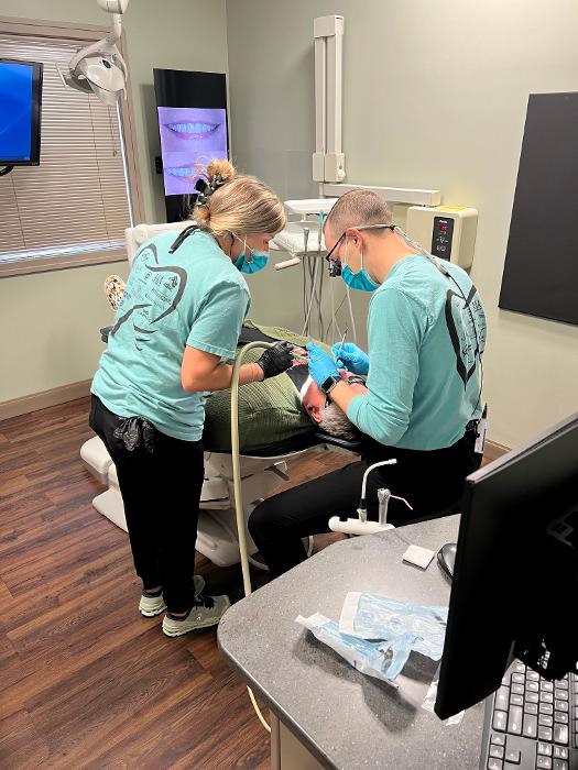 free dental day in all in the family dental