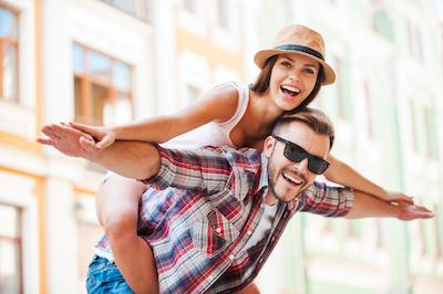 man and woman smiling 