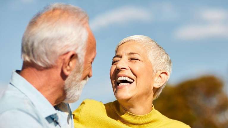 couple looking at each other while smiling
