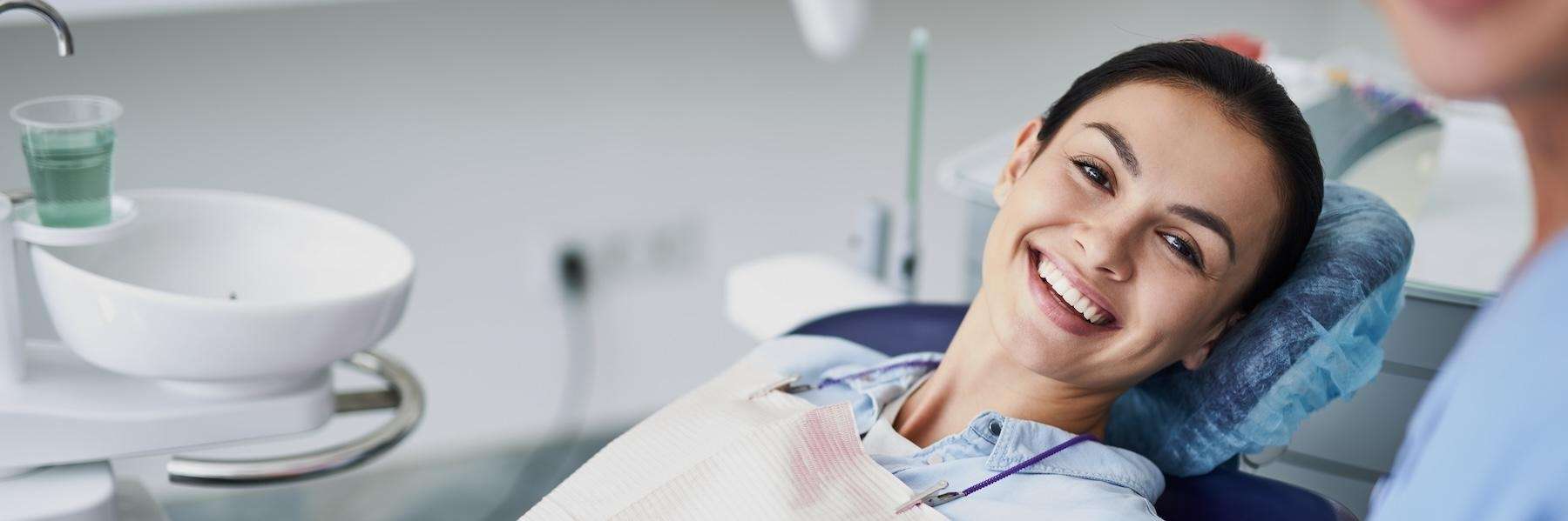 woman sitting in a dental chair